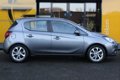 Opel Corsa - 1.4 Online Edition NAVI/PDC V+A / DAB+ / REGENSENSOR - 1 - Thumbnail