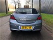 Opel Astra GTC - 1.6 Enjoy Nap, Airco, Cruise Control - 1 - Thumbnail