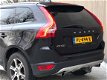 Volvo XC60 - 2.4D AWD Summum 2011 Zwart - 1 - Thumbnail