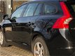 Volvo V60 - 1.6 D2 Kinetic 2015 Zwart *AUTOMAAT - 1 - Thumbnail