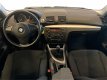 BMW 1-serie - 118i Executive aankoopkeuring toegestaan, inruil mogelijk, nwe apk - 1 - Thumbnail