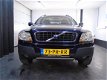 Volvo XC90 - 2.4 D5 Summum incl. NAVI./LEER en NWE APK/GARANTIE - 1 - Thumbnail