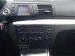 BMW 1-serie - 116i High Executive 5DRS LEER NAVI AIRCO NAP - 1 - Thumbnail