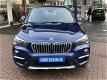 BMW X1 - 2.0 XDrive Executive X-line Automaat 192pk FULL OPTIONS #RIJKLAA - 1 - Thumbnail