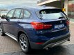 BMW X1 - 2.0 XDrive Executive X-line Automaat 192pk FULL OPTIONS #RIJKLAA - 1 - Thumbnail