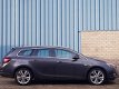 Opel Astra Sports Tourer - 1.6 16v 115pk SPORT |NAVI | CLIMA | CRUISE | 18 - 1 - Thumbnail