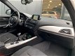 BMW 1-serie - 116i 2e eigenaar Xenon Navigatie Cruise - 1 - Thumbnail