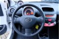 Toyota Aygo - 1.0 VVT-i Now / 5-DRS / AIRCO / - 1 - Thumbnail