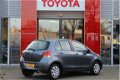 Toyota Yaris - 1.3 VVTi Aspiration *AUTOMAAT / PARKEERSENSOREN / CRUISE CONTROL - 1 - Thumbnail