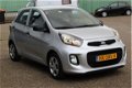 Kia Picanto - 1.0 CVVT EconomyLine (66pk) 5-drs/ Bumpers in kleur/ Deelbare achterbank/ Stuurbekr./ - 1 - Thumbnail