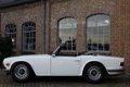 Triumph TR6 - Soft Top 1973 2.5 6 in lijn 165 PK, Euro Bumpers, Oldtimer Californië Roestvrij - 1 - Thumbnail