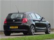 BMW 1-serie - 116i High Executive / Navigatie ECC NL 116 118i 118 - 1 - Thumbnail