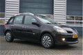 Renault Clio - 1.5 dCi Rip Curl Stationwagon | Airco | Radio/CD | Stuurwielbediening - 1 - Thumbnail