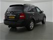 Kia Sorento - 3.3 V6 X-CLUSIVE LPG-G3 4WD 248 PK AUT. + STOELVERWARMING / NAVIGATIE / LEDER - 1 - Thumbnail