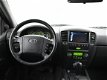 Kia Sorento - 3.3 V6 X-CLUSIVE LPG-G3 4WD 248 PK AUT. + STOELVERWARMING / NAVIGATIE / LEDER - 1 - Thumbnail