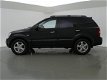 Kia Sorento - 3.3 V6 X-CLUSIVE LPG-G3 4WD 248 PK AUT. + STOELVERWARMING / NAVIGATIE / LEDER - 1 - Thumbnail