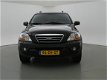 Kia Sorento - 3.3 V6 X-CLUSIVE LPG-G3 4WD 248 PK AUT. + STOELVERWARMING / NAVIGATIE / LEDER - 1 - Thumbnail