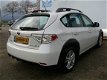 Subaru Impreza - 2.0R Sport 150 pk AWD Stoelverwarming. Sportstoelen, Airco, Elek Spiegels, Mistlamp - 1 - Thumbnail