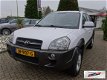 Hyundai Tucson - 2.0 CRDI Handgeschakeld Wit 2010 Airco - 1 - Thumbnail