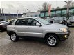 Kia Sportage - 2.0 CVVT Comfort Airco Cruise Netjes - 1 - Thumbnail