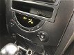 SsangYong Rexton - RX 270 Xdi Dynamic High Roof aut. grijs kenteken - 1 - Thumbnail
