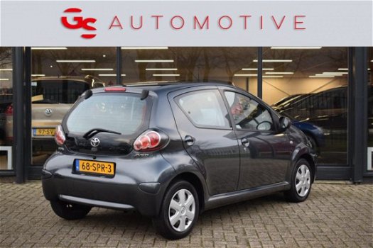 Toyota Aygo - 1.0-12V Comfort Navigator 68PK 5d 1e eig met navi, airco en radio cd speler - 1