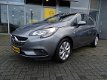 Opel Corsa - Favourite 1.4 90 pk - 5drs - navi - airco - lichtmetaal - parkeersensoren - zuinig en c - 1 - Thumbnail