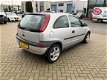 Opel Corsa - 1.4-16V Sport Goede nette auto weinig km nap - 1 - Thumbnail