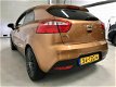 Kia Rio - 1.2 CVVT Super Pack Bj.12|navi|led|keyless|17inch|multistuur - 1 - Thumbnail