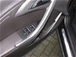 Opel Astra - Tourer Sport 1.4T 140PK met Navi, Cruise, trekhaak, PDC - 1 - Thumbnail