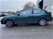 Hyundai Accent - 1.3i Active - 1 - Thumbnail