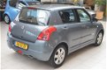 Suzuki Swift - 1.3 Shogun [DEALER OH |STOOT LIJST | AIRCO | LAGE KM] - 1 - Thumbnail