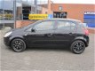 Opel Corsa - 1.0-12V Enjoy AIRCO, LMV en nwe APK - 1 - Thumbnail