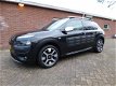 Citroën C4 Cactus - 1.2 PureTech Rip Curl 110PK PANODAK NAVI ECC 17 INCH LM VELGEN - 1 - Thumbnail