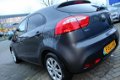 Kia Rio - 1.2 CVVT Plus Pack 86 PK / 5 DEURS / AIRCO / LAGE KM - 1 - Thumbnail