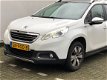 Peugeot 2008 - 1.2 PureTech Style Automaat met Panoramadak, Trekhaak, Climate Controle, All-Season B - 1 - Thumbnail