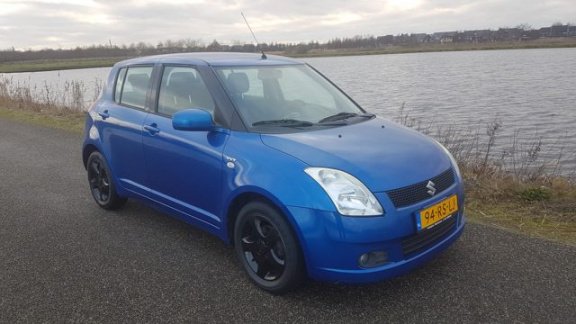 Suzuki Swift - 1.5 Exclusive - 1