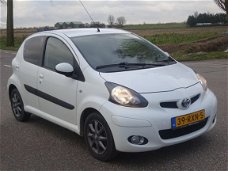 Toyota Aygo - 1.0-12V SPORT NAVI/LMV/ELRMN/CPV