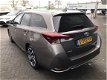 Toyota Auris Touring Sports - 1.8 Hybride Dynamic /navigatie/ - 1 - Thumbnail