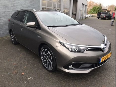 Toyota Auris Touring Sports - 1.8 Hybride Dynamic /navigatie/ - 1