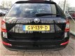 Skoda Octavia Combi - 1.6 TDI 110PK Style DSG Aut. Panorama Xenon Leder Navi - 1 - Thumbnail