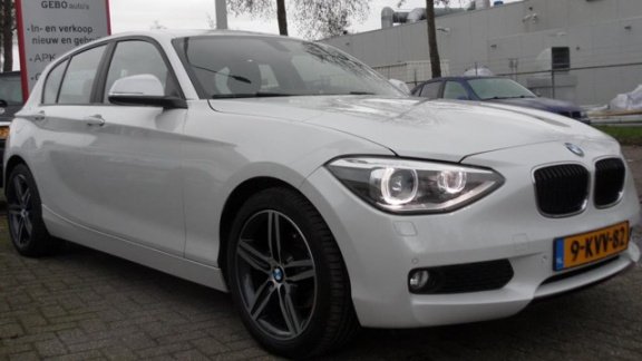 BMW 1-serie - 114i EDE Executive Palermoer Wit Navi Airco Cruise PDC - 1