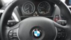 BMW 1-serie - 114i EDE Executive Palermoer Wit Navi Airco Cruise PDC - 1 - Thumbnail