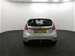 Ford Fiesta - 1.25 Limited 60pk | Airco | Elektrische ramen | All Season banden | Metallic lak | - 1 - Thumbnail