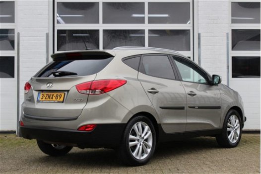 Hyundai ix35 - 2.0i 4WD Style LPG | Automaat | Panoramadak | Navigatie | Stoelverwarming | Cruise Co - 1