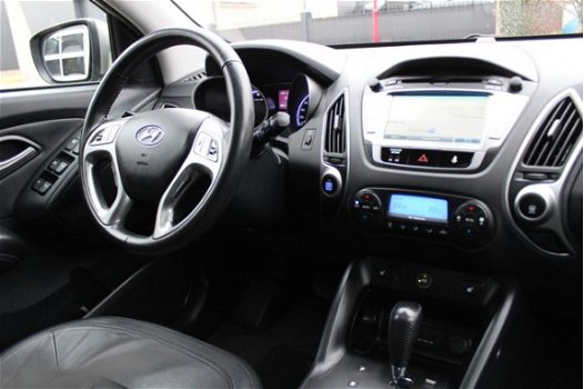 Hyundai ix35 - 2.0i 4WD Style LPG | Automaat | Panoramadak | Navigatie | Stoelverwarming | Cruise Co - 1