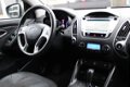 Hyundai ix35 - 2.0i 4WD Style LPG | Automaat | Panoramadak | Navigatie | Stoelverwarming | Cruise Co - 1 - Thumbnail