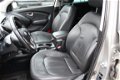 Hyundai ix35 - 2.0i 4WD Style LPG | Automaat | Panoramadak | Navigatie | Stoelverwarming | Cruise Co - 1 - Thumbnail