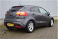 Kia Rio - 1.2 CVVT EXECUTIVELINE CLIMA | LMV | TREKHAAK | CV | RIJKLAAR - 1 - Thumbnail