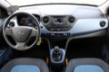 Hyundai i10 - 1.0i 66pk Blue Comfort + Tom Tom Rijklaar - 1 - Thumbnail